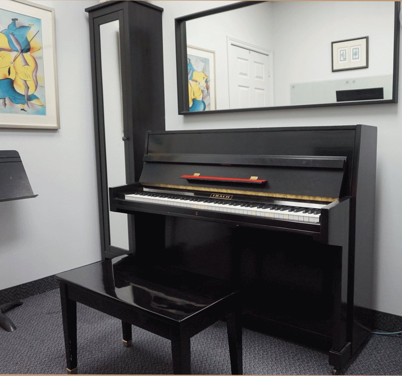 Ibach upright piano in a Wandering Minstrel teaching room