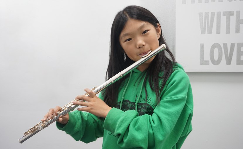 Girl playing flute in Mississauga